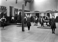 Inverness Royal Academy Gymnasium, 1912. Between 1895-1980 the IRA was located in the Midmills building, currently the UHI-Inverness College (2013). The classroom scene was photographed at the time of the completion of the first extension to the Academy, running along Midmills Road opposite the side entrance to the Crown Church. The accommodation was shared in the early years with Inverness High School, when that school occupied the building which now houses the Crown School, only a short distance away. Accommodation included rooms for science and art, with a gymnasium and these are 'posed' publicity shots. This image was captioned Gymnasium in the Highland Times, 2nd July 1914. (Courtesy Inverness Royal Academy Archive IRAA_057).