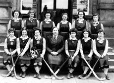 Hockey 1st XI 1950-1951. Rear: Betty Stoddart, Sylvia MacLeod, Alison Boag, Pat MacLeod, Shona MacKintosh, Margaret MacKinnon. Front: Jean Douglas, Helen Ford, Sandra Oliver (C), Miss Maude Yule, Margaret Oliver, Alice MacLeod, Lousie Goulder. (Courtesy Inverness Royal Academy Archive IRAA_066).