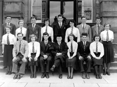 Inverness Royal Academy Prefects 1951-1952. Rear: Mary Smith, Alistair MacBeath, Ann Graham, Leslie Hodge, Jean Douglas, Sandy Sanderson, Joan Latham, David Forrest, Sandy Davidson, Jean Drummond. Front: Neil Smith, Sylvia MacLeod (VC), Gordon Beveridge (C), Rector D.J MacDonald, Jessmar Williamson, Donald W. Fraser (VC), Alison Boag. (Courtesy Inverness Royal Academy Archive IRAA_072).