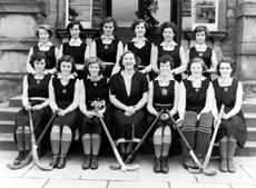 Girl's Hockey 1st XI 1951-1952. Rear: Mary Smith, Frances MacDonald, Anne Campbell, Ruth McArdle, Catherine Morrison, Evelyn Farquhar. Front: Joan Robertson, Alison Boag, Sylvia MacLeod (C), Miss Maude Yule, Jean Douglas (VC), Sheila Martin, Shona MacKintosh. (Courtesy Inverness Royal Academy Archive IRAA_076).