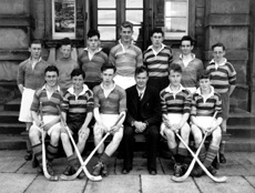 Shinty 1st XI  1953-1954. Rear: A. Fraser,               D. Kennedy, D. MacLennan, D. Michael, S. MacInnes, William Stoddart, A. Munro. Front: R. Cameron,       F. MacRae, S. Graham, H. Grant, A. Finlayson. (Courtesy Inverness Royal Academy Archive IRAA_080).