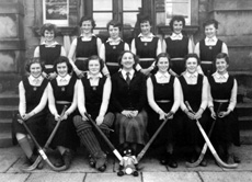 Hockey XI 1953-1954. Rear: K. Kane, V. Beveridge, S. Love, M. Sinclair, P. MacLeod, E. Grant. Front: A. Robertson, J. Fraser, S. Martin, Miss Maude Yule, H. Rose, H. MacAuley, E. Farquhar. (Courtesy Inverness Royal Academy Archive IRAA_083).