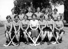 Hockey 1954-1955. Rear: Helen Simpson, Morven Jenkins, Ena Munro, Elizabeth McIntyre, Winifred Elliot, Catherine McInnis. Front: Patricia Cumming, Elizabeth Mann, Margaret Ferguson, Sheila Momsen, Pat Urquhart, Ann Dand. (Courtesy Inverness Royal Academy Archive IRAA_097).