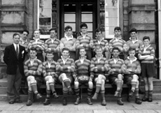 Rugby 1st XV 1955-1956. Rear: Donald MacLeod, Hamish Smith, John MacGillivray, Alastair MacLeary, James Wylie, Alastair Yeudall, Jack Bosworth, John MacArthur. Front: Mr Murray, David Moffat, Robert Ewen, Roderick MacKenzie, Ian Robin, John   Robertson, Robert Dewar, Ewan Lawson, David Philip. (Courtesy Inverness Royal Academy Archive IRAA_105).