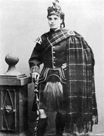 Jane Mary Sutherland (known as Jeannie) in Highland dress,  born 1882 on Barra and married John Urquhart of The Loans of Tullich, near Fearn, Rosshire. Submitted by Carole Urquhart James. 