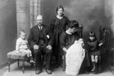 Christening of Donald Hugh Urquhart (born April 1923) with from left: David MacLeod Urquhart, father John Urquhart, cousin Catherine Ross, mother Jeannie Urquhart (nee Sutherland), and Mhairi Catherine Urquhart. Submitted by Carole Urquhart James.