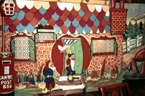 Playhouse Cinema foyer and restaurant, Christmas 1957. Every Christmas season, James Nairn, photographer and manager of the Playhouse, would decorate the foyer and cafe with hand painted cartoon and Disney themes to the delight of visiting children. The Playhouse Cinema was destroyed by fire in 1972, and sadly James Nairn lost the bulk of his photographic and memorabilia archives. (Courtesy James S Nairn Colour Collection). ~ *