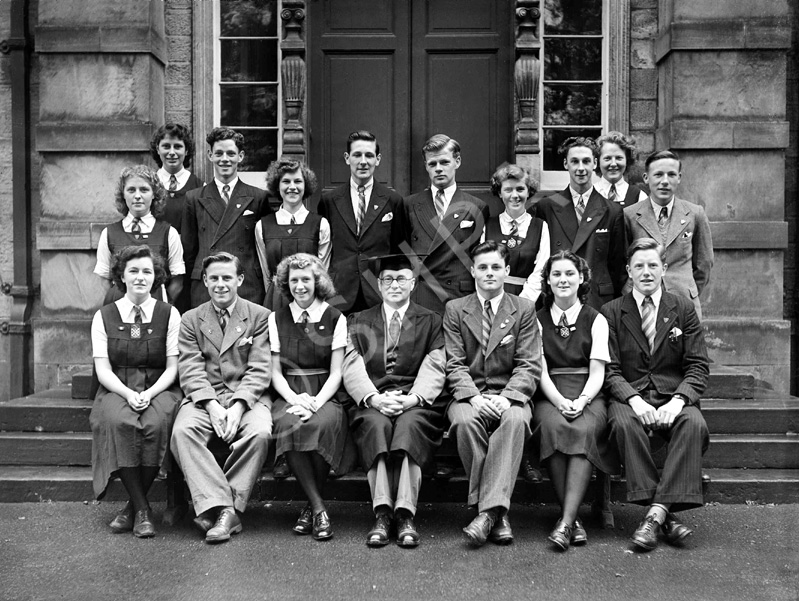 Inverness Royal Academy Prefects 1948-1949. Rear: Peggy MacLeod, Margaret MacLennan, Roderick A. MacLeod, Peggy Fraser, Stanley Fleming, James MacKenzie, Deirdre Munro, Frank Taylor, Aileen Munro, Ross Martin. Front: Erica Donald, Scott Moffatt (VC), Aileen Barr (C), Rector D.J MacDonald, Allan Cameron (C), Lorna Menzies (VC), Angus MacKenzie. See also IRAA_045.