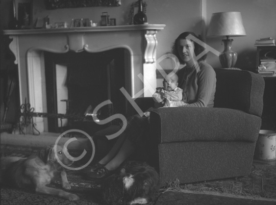 Baby on sofa, inscription 'Aldourie.' (Aldourie was the home of the Fraser-Tytler family). #