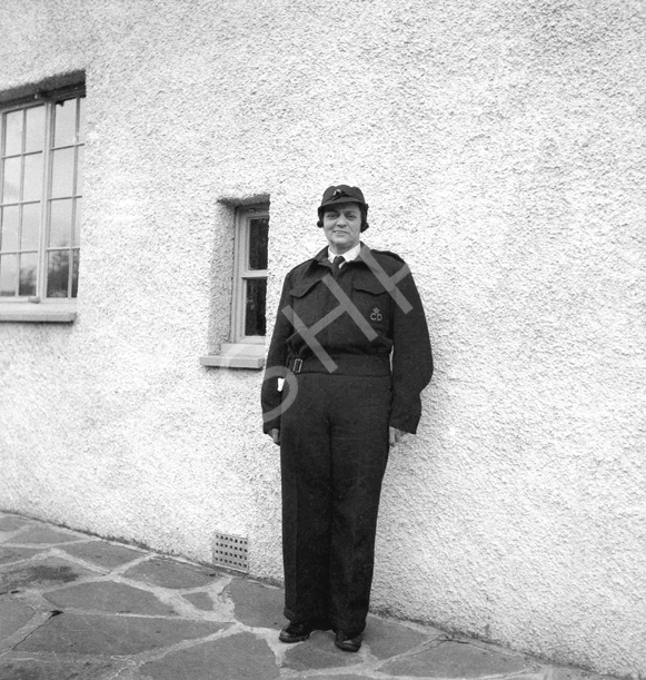 Stella Paterson wearing Civil Defense uniform at 7 Culduthel Gardens, Inverness c1945-1946. Her husband was Hector Paterson, son of famous photographer Andrew Paterson (1877-1948).