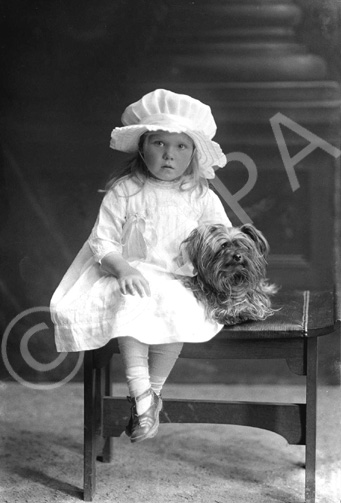 Fraser, Lilly Bank, Fort Augustus. Girl toddler with silky terrier.  