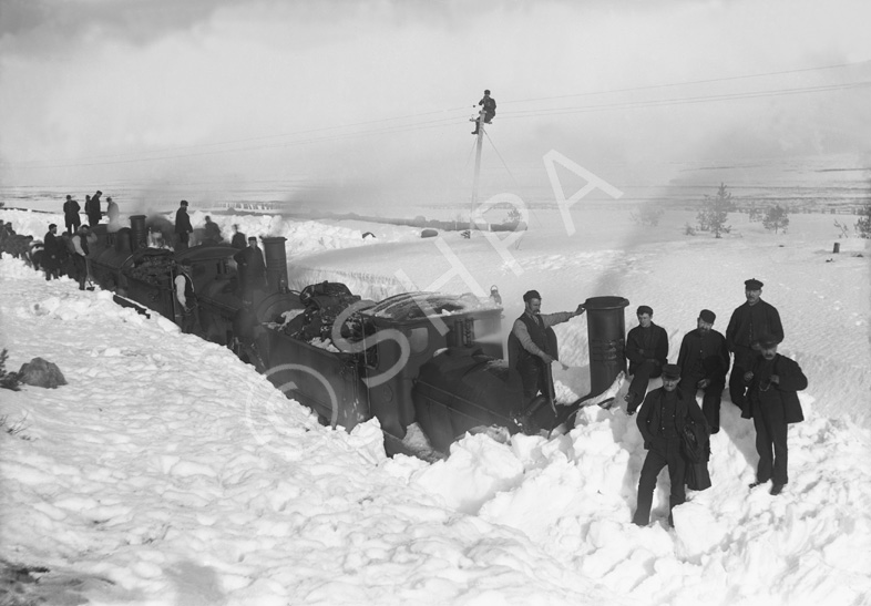Three Highland Railway engines being dug out of a snowdrift, February 1895.* .....