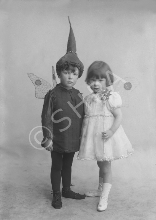 Boy and girl dressed in fancy dress, a pixie and a fairy, named under Mrs  Allan Gilmour, Rhindnie, Lentran.