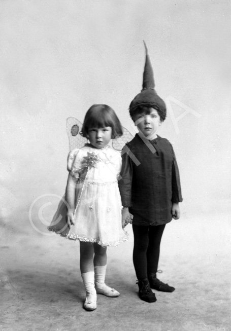 Boy and girl dressed in fancy dress, a pixie and a fairy, named under Mrs Allan Gilmour, Rhindnie, Lentran.