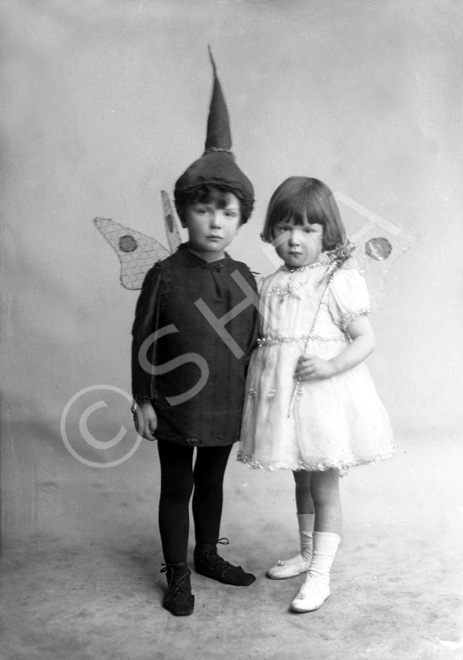 Boy and girl dressed in fancy dress, a pixie and a fairy, named under Mrs Allan Gilmour, Rhindnie, Lentran.