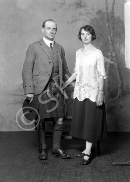 Mr Mackenzie, School House, Balnain, Inverness. Woman also appears in 25177a.