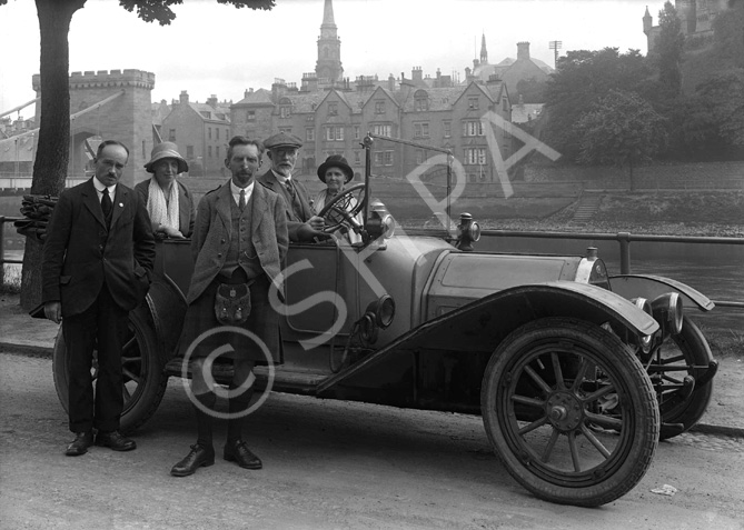 Scottish Home Rule Group outside the Palace Hotel, standing beside vintage car with Ness Bridge in t.....