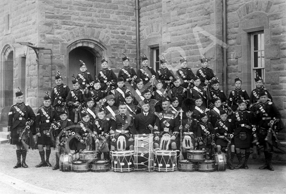 Pipes & Drum Band, Queen Victoria School, Dunblane. Possibly taken at Cameron Barracks, Inverness, c.....