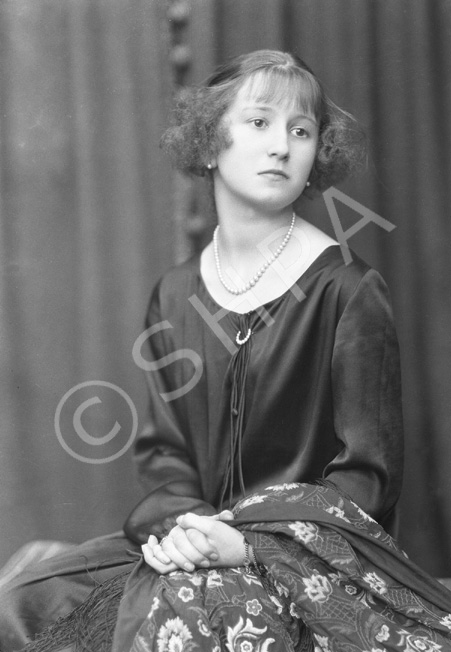 Miss Lilian Elford, Rosehaugh House, circa September 1925. Daughter of Colonel and Ethel Elford, and niece of Lilian Fletcher of Rosehaugh. Lilian became an expert horsewoman and married Captain Charles John Shaw-Mackenzie of the Newhall estate at Rosehaugh in 1933. They were known as Major and Mrs Shaw-Mackenzie of Tordarroch, and Lilian resided in Newhall until her death in 1990. 