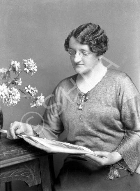 Woman reading magazine. #