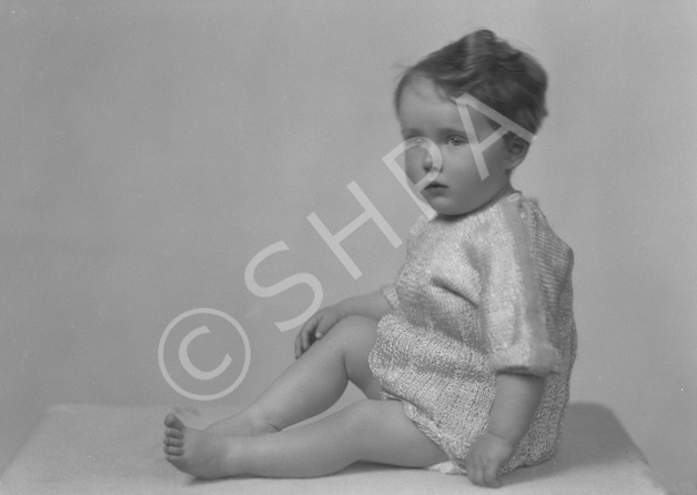 Watson, toddler sitting.