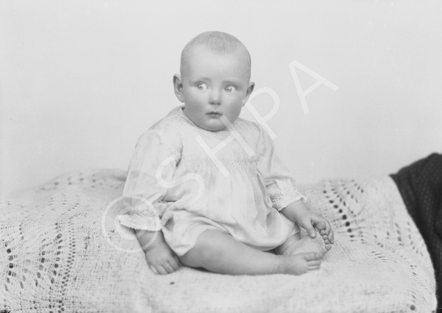 Grant, baby on table.