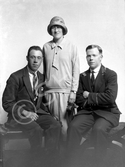 Portrait. The man on the right is wearing the uniform of Neish's Hotel (previously the Albert Hotel), which was at 66 Eastgate, Inverness. #