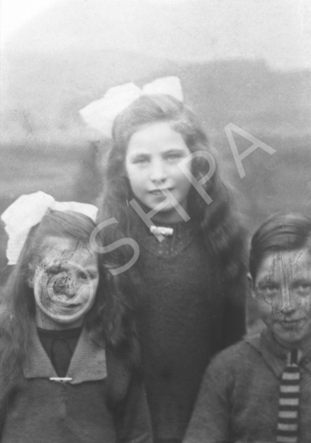 Mrs Mackay, Bunchrubin, Torness. 23.08.1926. Job request was for a print only of the girl in the middle, explaining the reason why the faces of the other two children have been blacked out.    