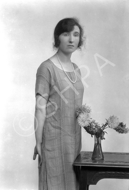 Miss MacLean. She also features in group portrait 26158......