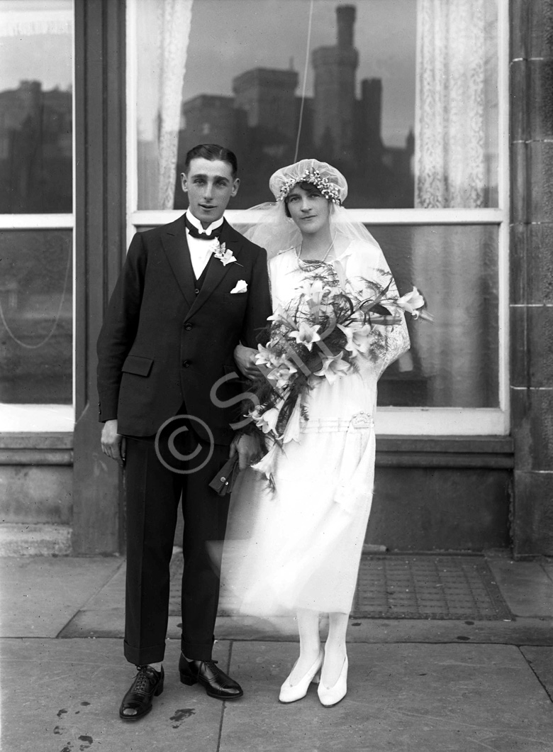 Mackenzie wedding group, from Aultbea, with reflection of Inverness Castle in the windows of the Columba Hotel. 