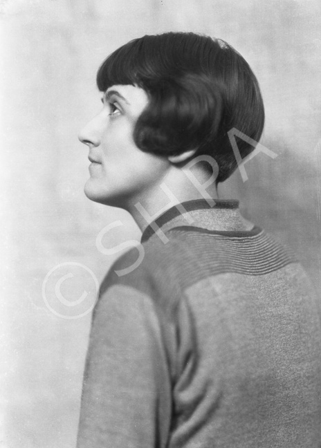 Woman in profile portrait.#