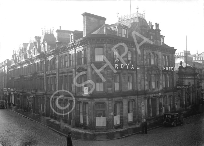 Royal Hotel Inverness, Academy Street, showing vintage car and entrance to Victorian Market. Now occupied by the Clydesdale Bank. December 1930. *