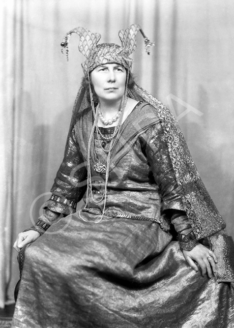 Actress Nelly Hutin Britton was born on 24th April 1876 in Bucklebury, Berkshire. Famous for her Shakespearean roles, she debuted in 1901 in 'Henry V.' She also played Hero in 'Much Ado About Nothing' (1903), Ophelia in 'Hamlet' (1909), Lady Elizabeth in 'Richard III' (1909) and Lady Macbeth at Stratford (1911). In 1903 she married famous actor Matheson Lang, and thereafter they appeared together frequently on stage and later on film. In 1906 she played Arganthael in 'Tristram and Iseult' at the Adelphi Theatre, with Lang as Tristram. Britton and Lang subsequently formed their own company, which toured India, South Africa and Australia from 1910-13 performing Shakespeare. Her roles included Katherine in 'The Taming of the Shrew,' Portia in 'The Merchant of Venice,' Juliet in 'Romeo and Juliet,' as well as reprising the roles of Ophelia and Lady Macbeth. She also appeared with Lang in 'Mr Wu,' which became his signature role. In 1916 they appeared together in a silent film of 'The Merchant of Venice' in which she once again played Portia. She also joined her husband in the film 'The Wandering Jew' (1923) playing the part of Judith. After a four-year illness and a temporary retirement, she returned to the Old Vic stage in 1923 for the Shakespeare Birthday Festival and the following year as Volumnia in 'Coriolanus,' and continued to act until she retired in 1936. In 1940 the Langs were staying with their old friend Dornford Yates and his wife at their house near Pau in France when France surrendered, and they had to escape from the advancing Germans through Spain to Portugal. In later life she sat on the governing board of the Old Vic Theatre. She died on 3rd September 1965 aged 89. These promotional shots were probably taken for the Inverness performance of 'The Wandering Jew' in October 1936, which played to a packed house for several days at the Empire Theatre.