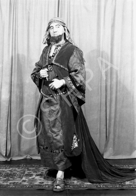 Matheson Lang was born in Montreal, Canada, the son of Rev. Gavin Lang of Inverness, Scotland on 15th May 1879. (One of Gavin Lang's grandchildren, Cosmo Lang, became Archbishop of Canterbury). He was educated at Inverness College and the University of St Andrews and made his stage debut in 1897, becoming known for his Shakespearean roles in such plays as 'Hamlet,' 'Macbeth,' and 'Romeo and Juliet.' He also appeared in plays by Ibsen and Shaw and performed in the theatrical companies of Sir Frank Benson, Lillie Langtry and Ellen Terry. In 1903 he married actress Nellie Hutin Britton in London. In 1906 he played Tristram in 'Tristram and Iseult' at the Adelphi Theatre, with Lily Brayton as Iseult and Oscar Asche as King Mark; Lang's wife played Arganthael.  Lang and his wife subsequently formed their own company, which toured India, South Africa, and Australia from 1910-13 performing Shakespeare. In 1913, Lang returned to England and created one of his most memorable roles, the title character in 'Mr. Wu.' He reprised this part in a 1919 silent film, and became so identified with the role that he titled his 1940 memoirs 'Mr. Wu Looks Back.' In 1914, he and Britton successfully produced 'The Taming of the Shrew,' 'The Merchant of Venice,' and 'Hamlet' at the Old Vic. In 1916, Lang became one of the first major theatre stars to act in a silent film, as Shylock in 'The Merchant of Venice,' with his wife as Portia. He went on to appear in over 30 films and was one of Britain's leading movie stars of the 1920s. Among his memorable roles were Guy Fawkes (1923), Matthias in 'The Wandering Jew' (1923) (which also featured his wife as Judith), Henry IV in 'Henry, King of Navarre' (1924), and Henry V in 'Royal Cavalcade' (1935).  Lang also wrote the plays 'Carnival' (1919) and 'The Purple Mask' (1920), both of which were produced on Broadway and made into films. In 1940 the Langs were staying with their old friend Dornford Yates and his wife at their house near Pau in France when France surrendered, and they had to escape from the advancing Germans through Spain to Portugal. Matheson Lang died in Bridgetown, Barbados on 11th April 1948 at age 68. These promotional shots were probably taken for the Inverness performance of 'The Wandering Jew' in October 1936, which played to a packed house for several days at the Empire Theatre. Matheson Lang received a rapturous welcome and at the end of the performance he was recalled time and again, and he said it had been a most memorable night for him.