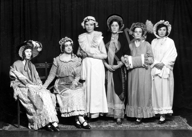 Captioned 'April Showers,' possibly from a theatre production. #