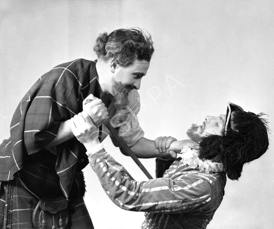 Sorrell vs MacKinnon. Stage actors in costume posing for publicity shots. See also 31334a to 31334c. Man wearing hat is believed to be Henry Christie Landon Sorrell, involved in local amateur dramatics, and manager of the Inverness Repertory Company in 1937 and of the Little Theatre in Inverness, taking over from Ronald Macdonald Douglas in August 1938. (Born 1911 in Endon).