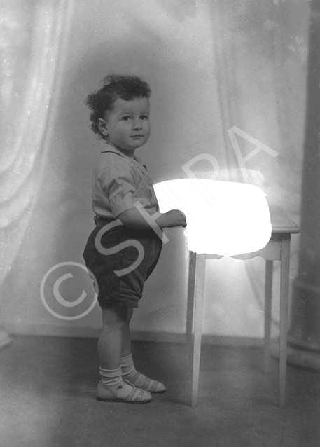 Mrs Capaldi Jan 1938. This image was to be super-imposed onto photograph 31608a, with the child's hand resting on Mrs Capaldi's knee.