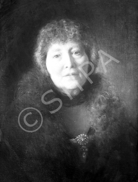 Mrs Burton Mackenzie of Kilcoy Castle, Ross-shire.  The Kilcoy estates passed through the male line of the Mackenzies of Kilcoy until the death in 1883 of Sir Evan Mackenzie, 2nd Baronet, when they were inherited by his eldest daughter, Isabella Jane. She had been born in Australia and had married Colonel John Edward Burton (1835-1901) on 30th March 1869. The castle was restored from a ruinous condition in about 1891.    