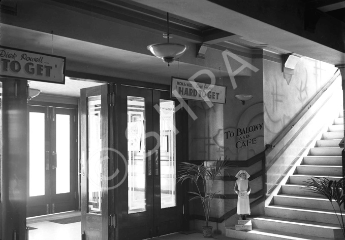 Palace Cinema foyer, Huntly Street, Inverness. Opened 21st November 1938 with 'Hard to Get' starring Dick Powell, after a ceremony performed by Provost Hugh Mackenzie. The nurse figurine in the foyer is a charity collection box in aid of the Royal Northern Infirmary. The Palace once seated 1,023 patrons. It closed in 1963 and became a bingo hall until it was finally demolished in 2010. *