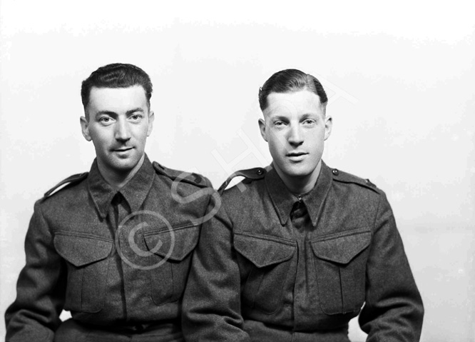 Pte J. Maxwell (left) and Pte J. Stewart, Seaforth Highlanders. Single negative with two ref numbers. 