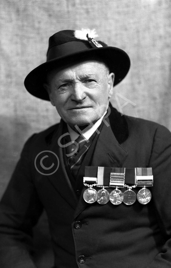 Mr Collins, Clachnaharry. His medals include the India General Service medal (1854-1895), Queen's Sudan medal (1896-1897), Queen's South Africa medal (1899-1902), unidentified and the Khedive's Sudan medal (1896-1908). See also image 36719.5. 