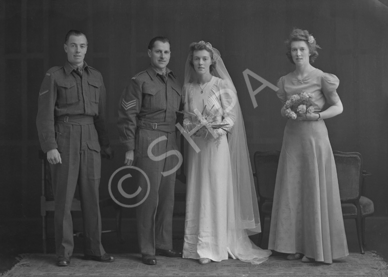 Married couple with attendants, bridal. Knocknagael written on envelope.#