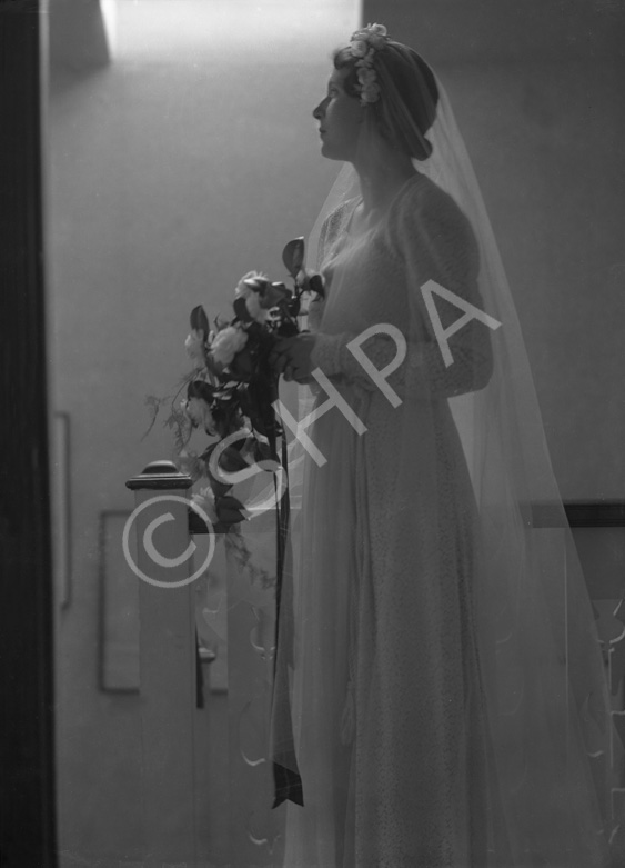 Major & Mrs Fraser, bridal. Miss Nancy Ford, daughter of Major John Ford DCM, late Cameron Highlanders, and Mrs Ford, Inverness. She married Major James W. Fraser on 15th February 1943.