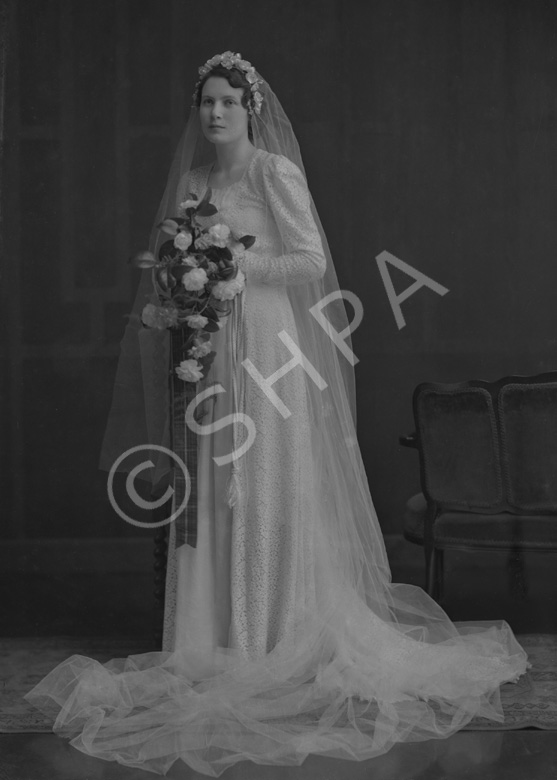 Major & Mrs Fraser, bridal. Miss Nancy Ford, daughter of Major John Ford DCM, late Cameron Highlanders, and Mrs Ford, Inverness. She married Major James W. Fraser on 15th February 1943.