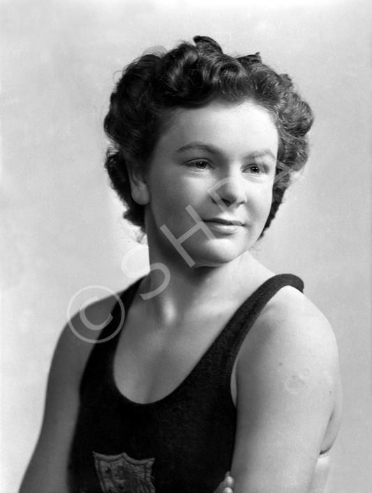 Miss Margaret Munro was the holder of several national swimming titles. She later emigrated to Austr.....