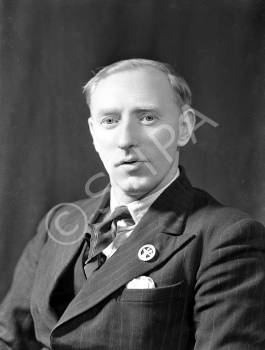 M. Earles, Newfoundland, Edderton. He is wearing a  World War II Newfoundland Forestry Unit, 3rd Inverness Battalion, Scottish Home Guard Badge. These silver plated badges, worn in the field service cap or as mufti lapel badge are now very rare. See also 38442_power.