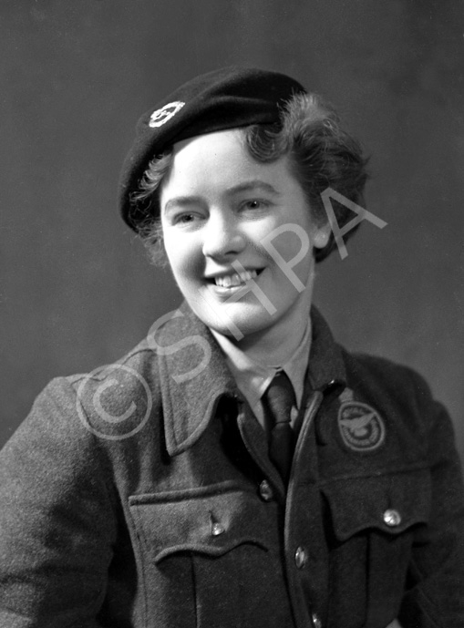 Mrs MacDonald, 15 Lovat Road, Inverness. She is wearing the badge of the Royal Observer Corps. 