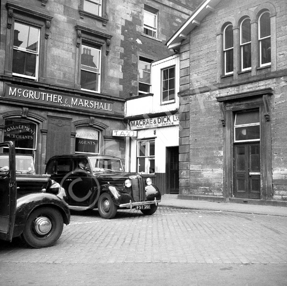 Macrae & Dick Taxi Booking Office in Station Square, the site now occupied by Mail Boxes Etc., with .....