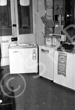 Interior of Mason's on Eastgate, featuring washing machines and boxes of Daz.* 