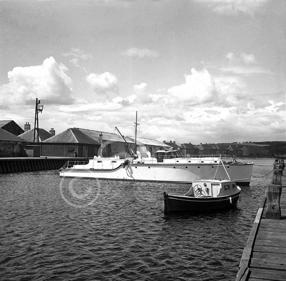 Jack Baxter. Polaris. February 1964. What appears to be a renovated WWII-period motor torpedo boat in Thornbush Quay, Anderson Street, Inverness. *